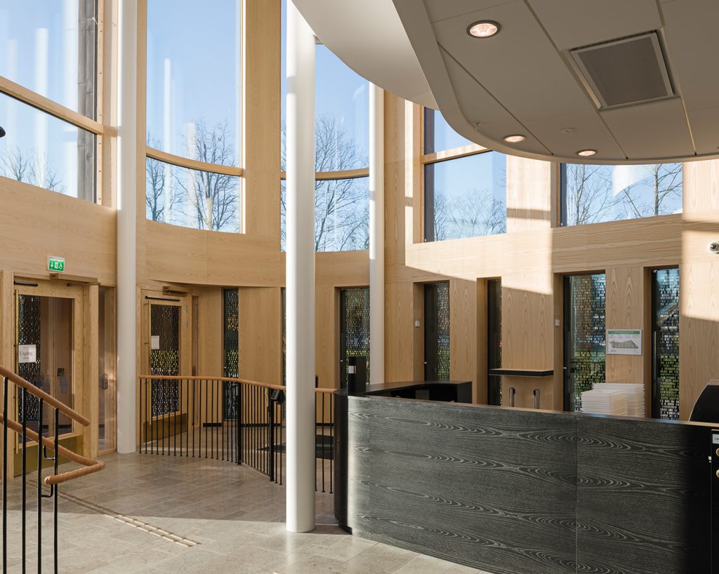 Court House entrance with ash veneered wall panels and painted veneered panels