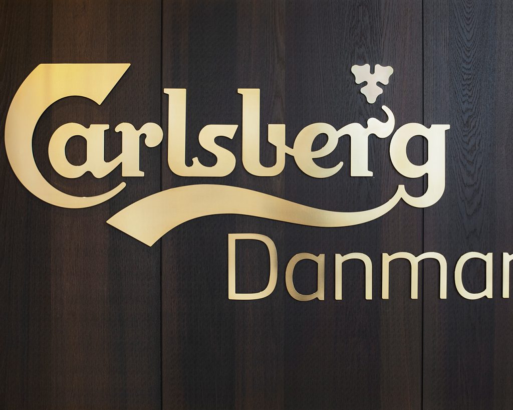 Carlsbergs logo on acoustic wood panels
