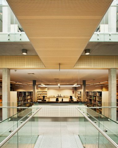 Wooden ceiling in library with PH8 perforation