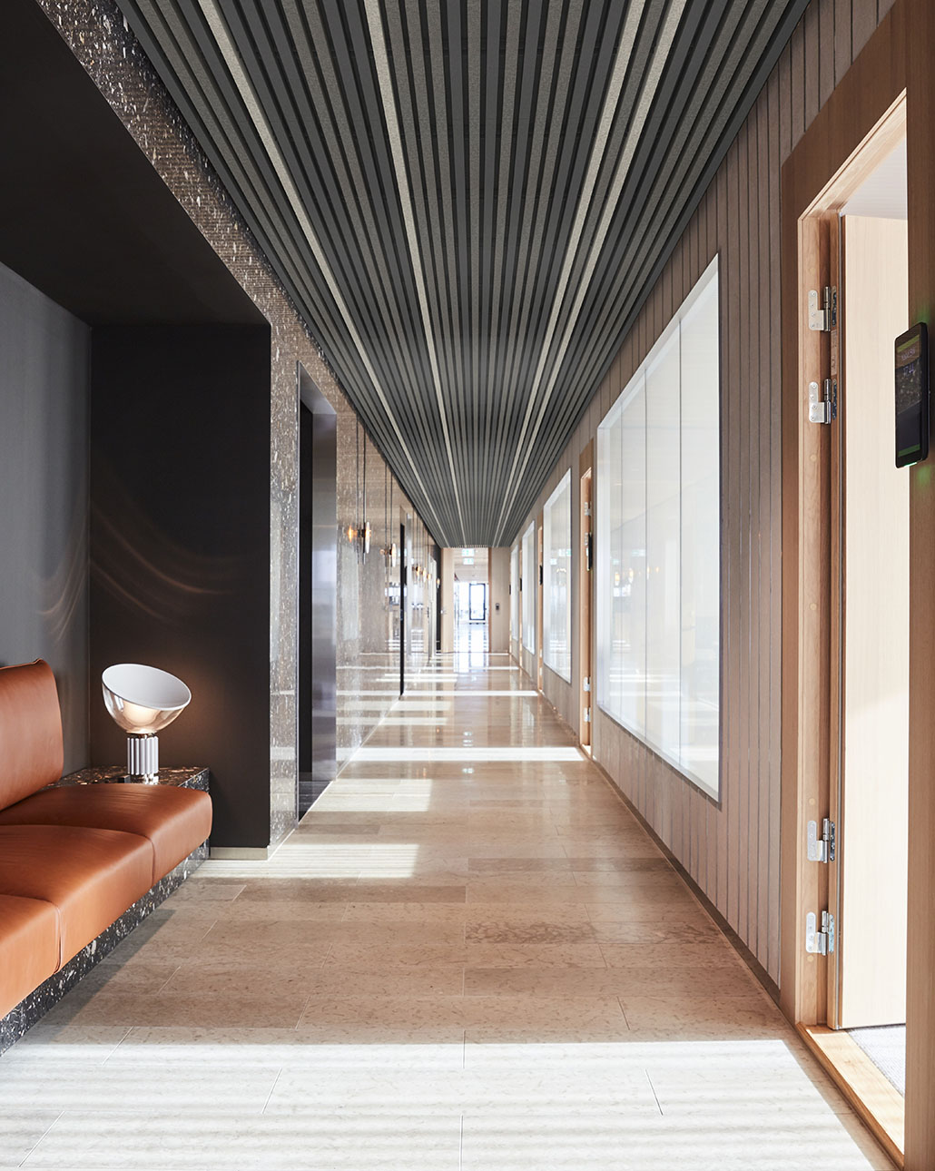 Hotel corridor with Gustafs Feltfon acoustic ceiling.