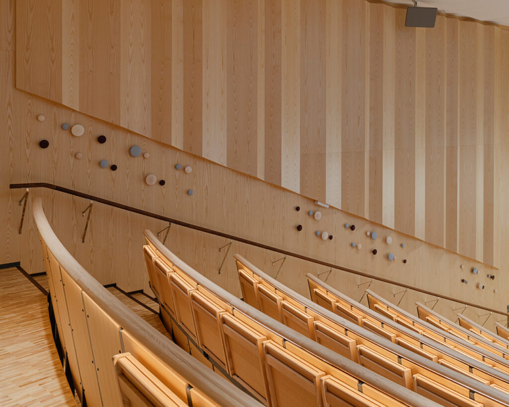 Corrugated panels in auditorium