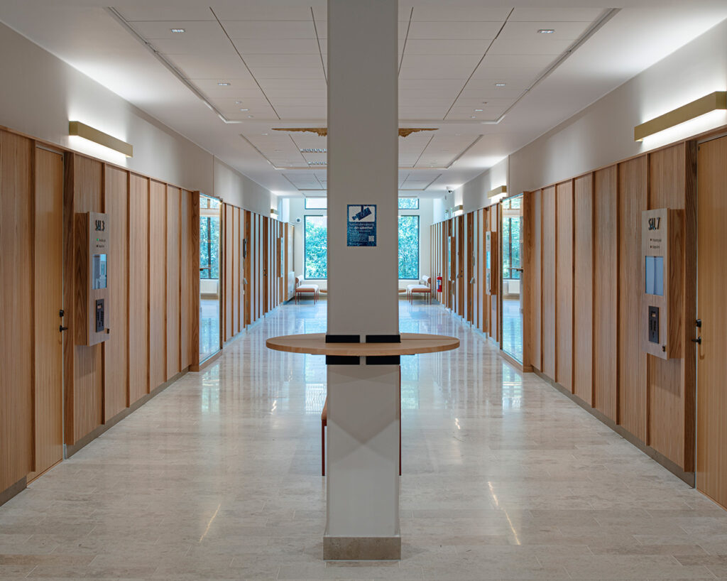 Framed elm panels in corridor