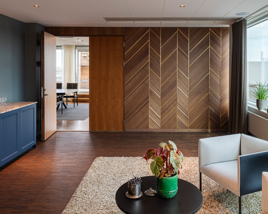 Lounge with bespoke walnut panels