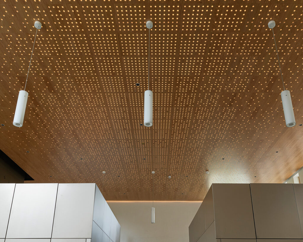 Backlit acoustic panels in ceiling