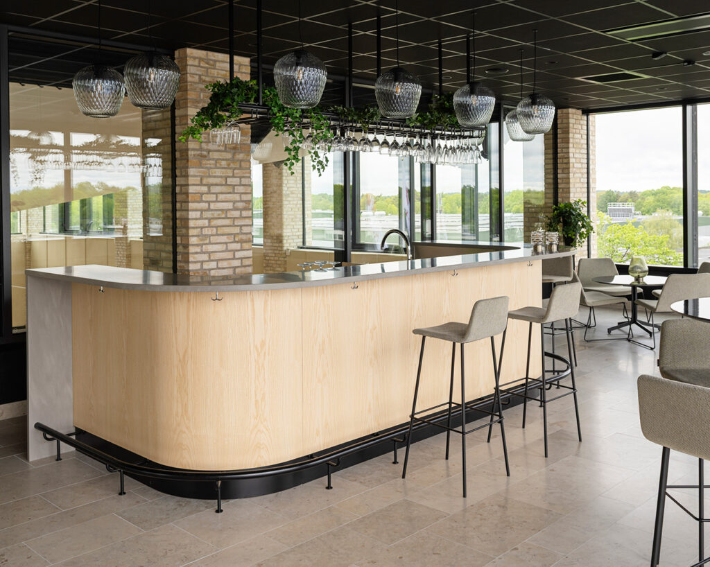 Bar clad in rounded ash panels