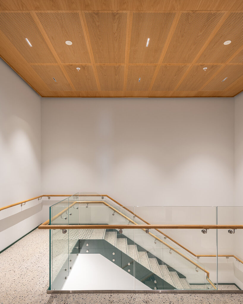 Perforated panels in staircase