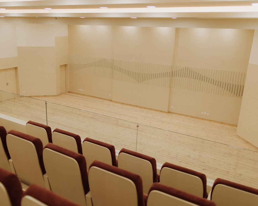 Birch veneered stage from seats