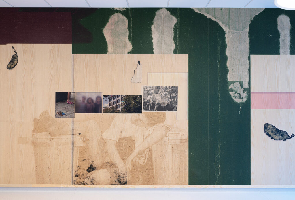 Sepia tone photo and green block printed on wall panels