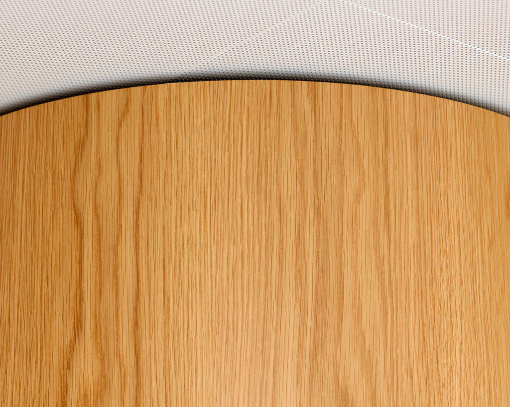 Oak panels meet ceiling