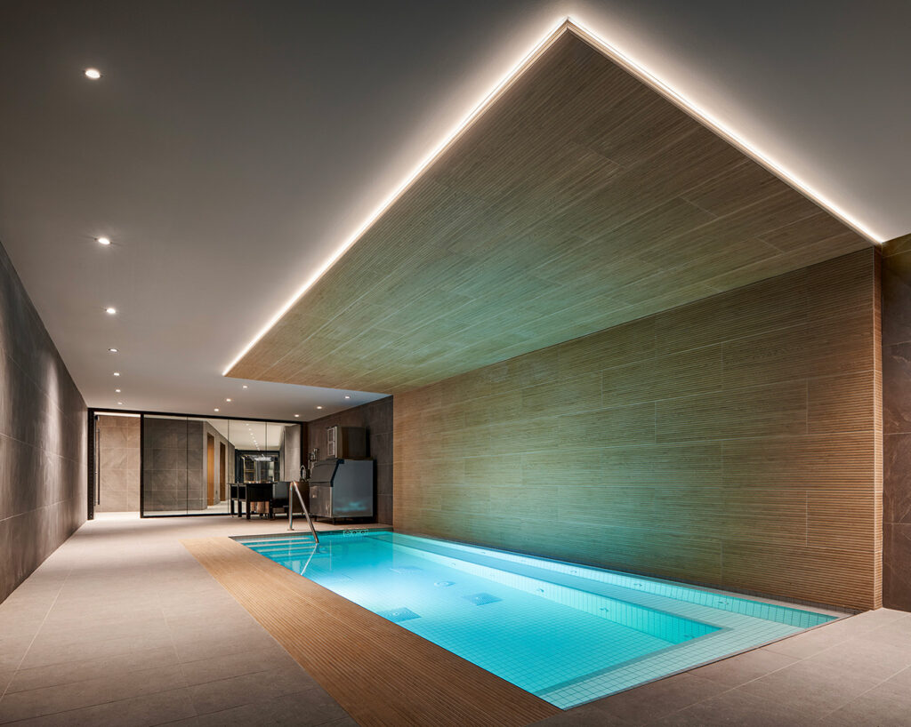Wood surrounded pool in locker room area